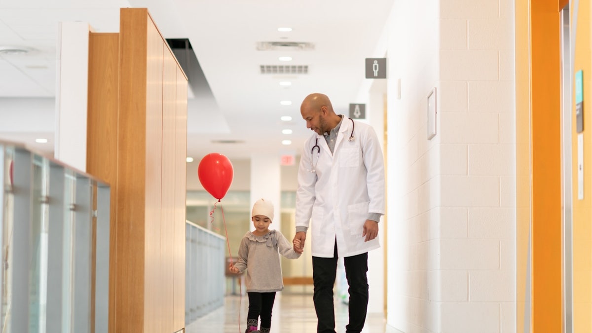 Child patient with doctor