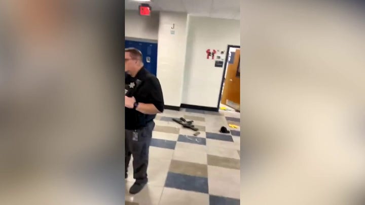 Video from Apalachee High School hallway shows gun