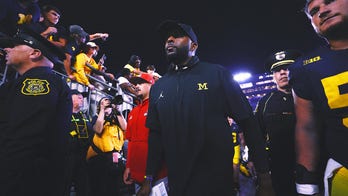 Michigan's Sherrone Moore has been coaching without a signed contract